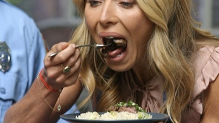 Kelly Ripa Opens Pretty Wide